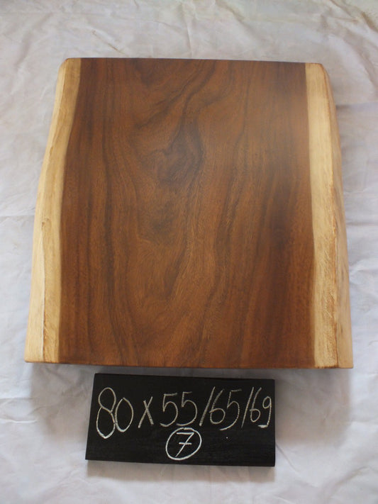 Top view of suar wood slab 0007-556568 with live edge shape and rich natural brown wood grain, solid single-piece countertop.
