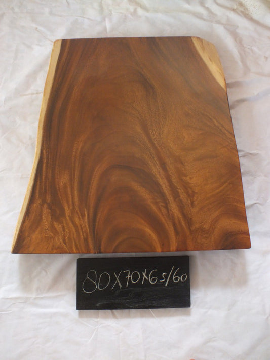 Top view of suar wood slab 0008-706560 with wide live edge shape and rich brown natural wood grain, solid single-piece countertop.
