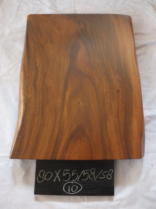 Top view of suar wood slab 0010-555858 with live edge shape and rich brown natural wood grain, solid single-piece countertop.
