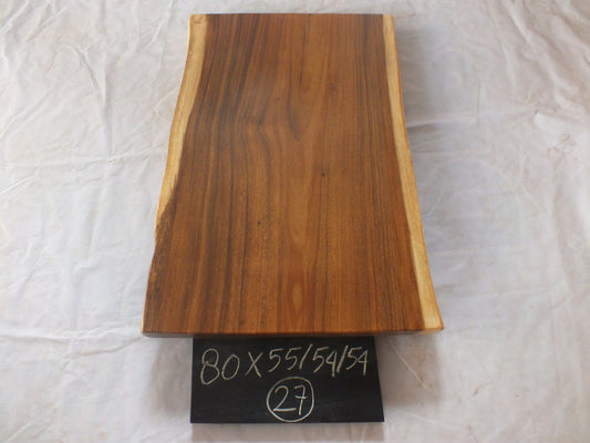 Top view of suar wood slab 0027-555454 with natural live edges and warm brown solid wood grain, single-piece hardwood countertop.
