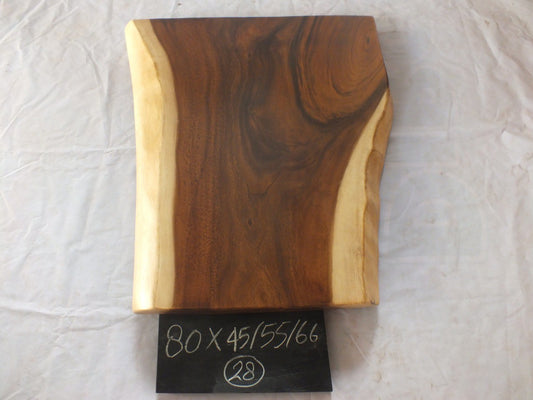 Top view of suar wood slab 0028-455566 with dramatic widening live edge shape and rich brown natural wood grain, solid single-piece countertop.
