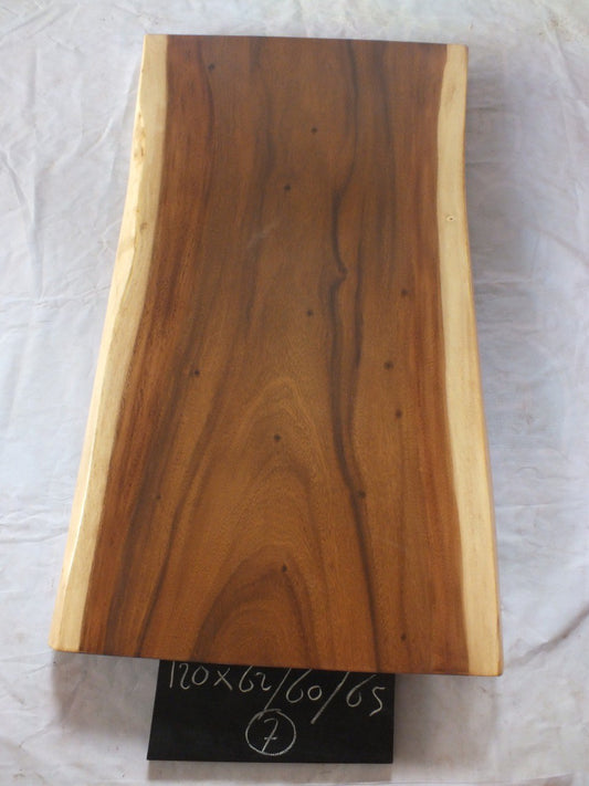 Top view of suar wood slab 0007-626065 with organic live edges and warm brown natural wood grain, solid single-piece countertop.
