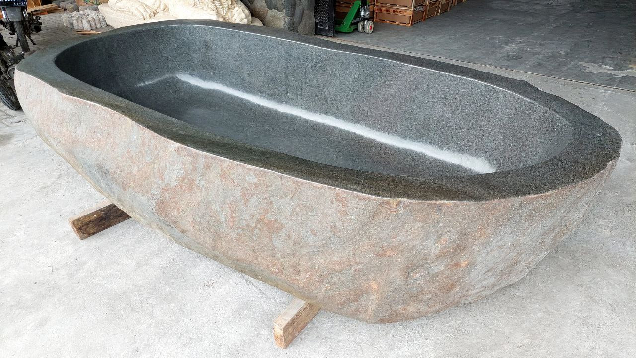 Luxury spa bathtub handcrafted from solid river stone
