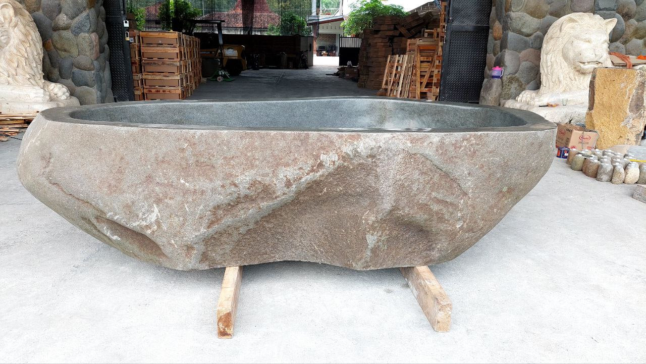 Luxury spa bathtub made from solid river stone

