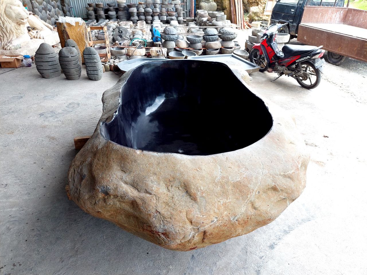 Natural stone bathtub close-up texture – handcrafted details
