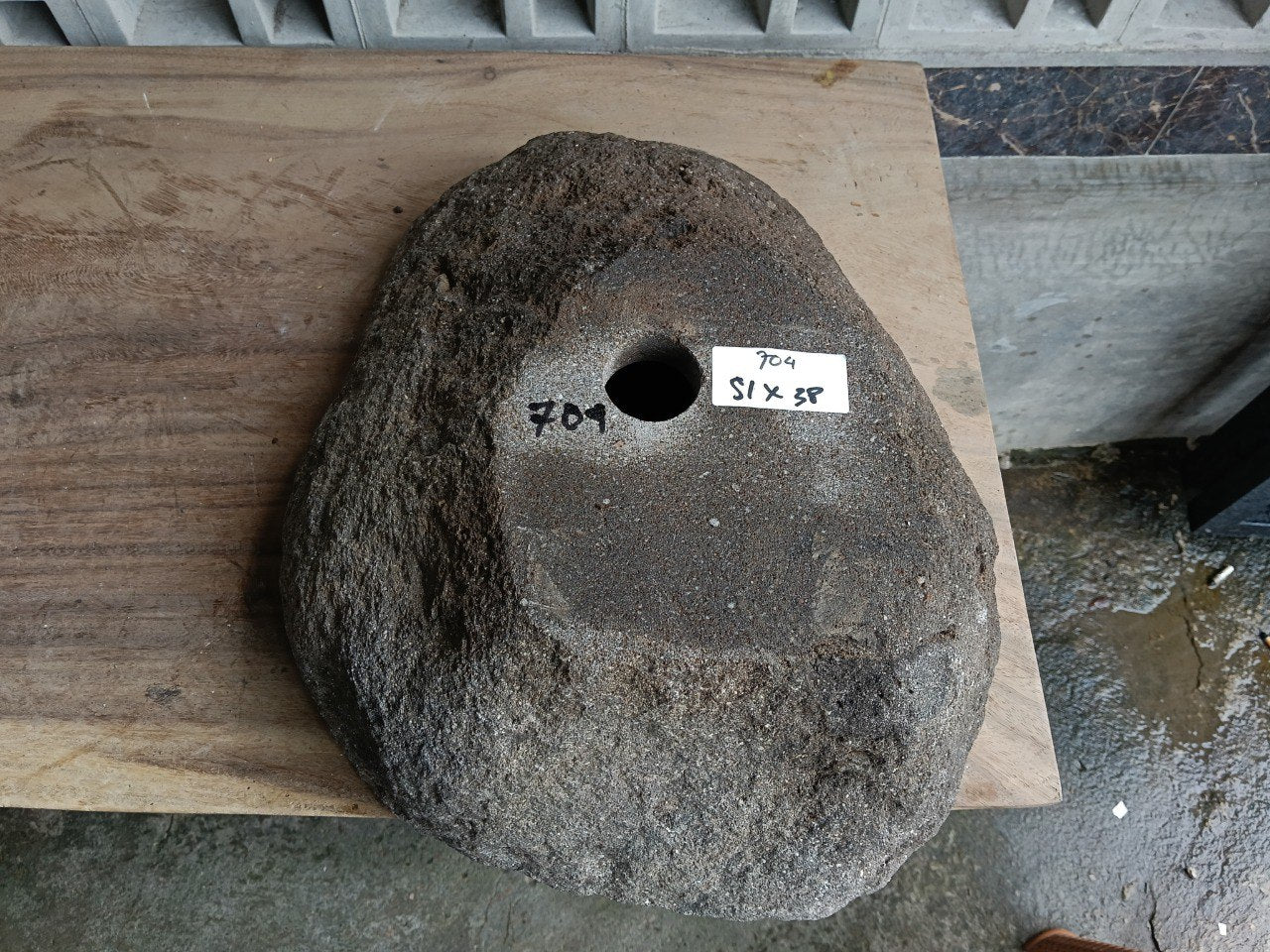 Bottom view of 6704-5138 solid river stone vessel
