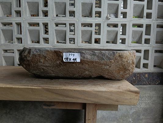 Front view of 6779-5844 river stone basin — polished interior
