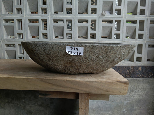 Front view of 6754-5737 river stone basin — polished interior
