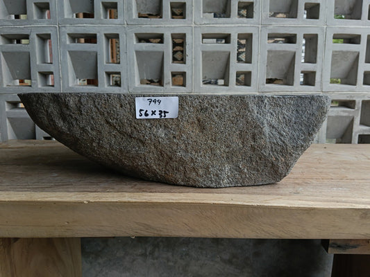 Front view of 6744-5635 river stone basin — polished interior
