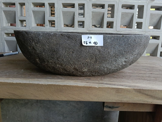 Front view of 6919-5640 river stone basin — polished interior
