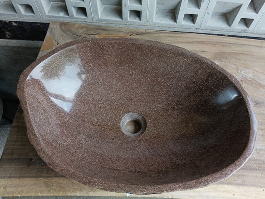 Top view of 6933-5337 brown river stone sink — handcrafted natural stone
