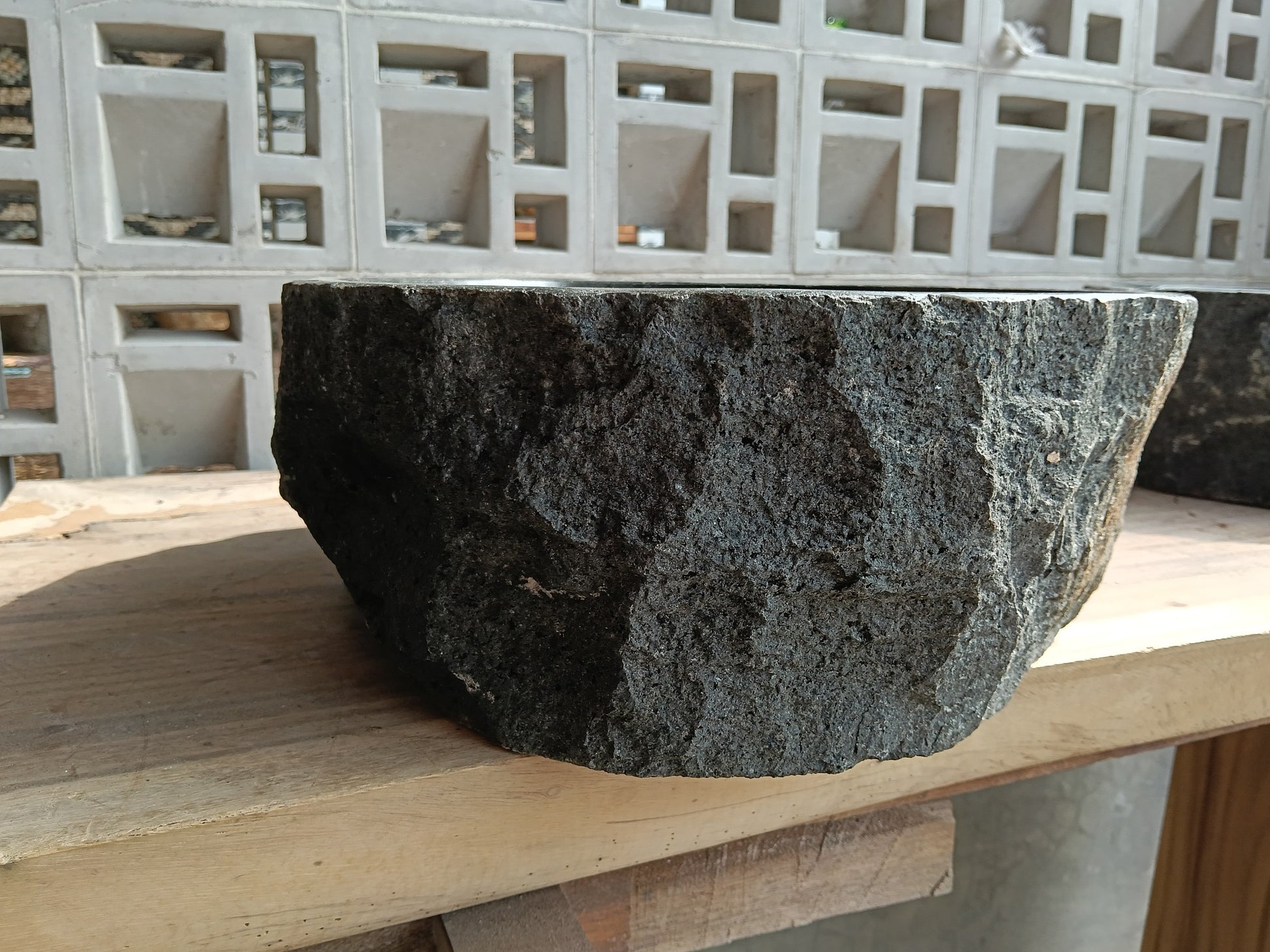 Right side of 60A7-4238 oval andesite vessel sink — smooth polished finish
