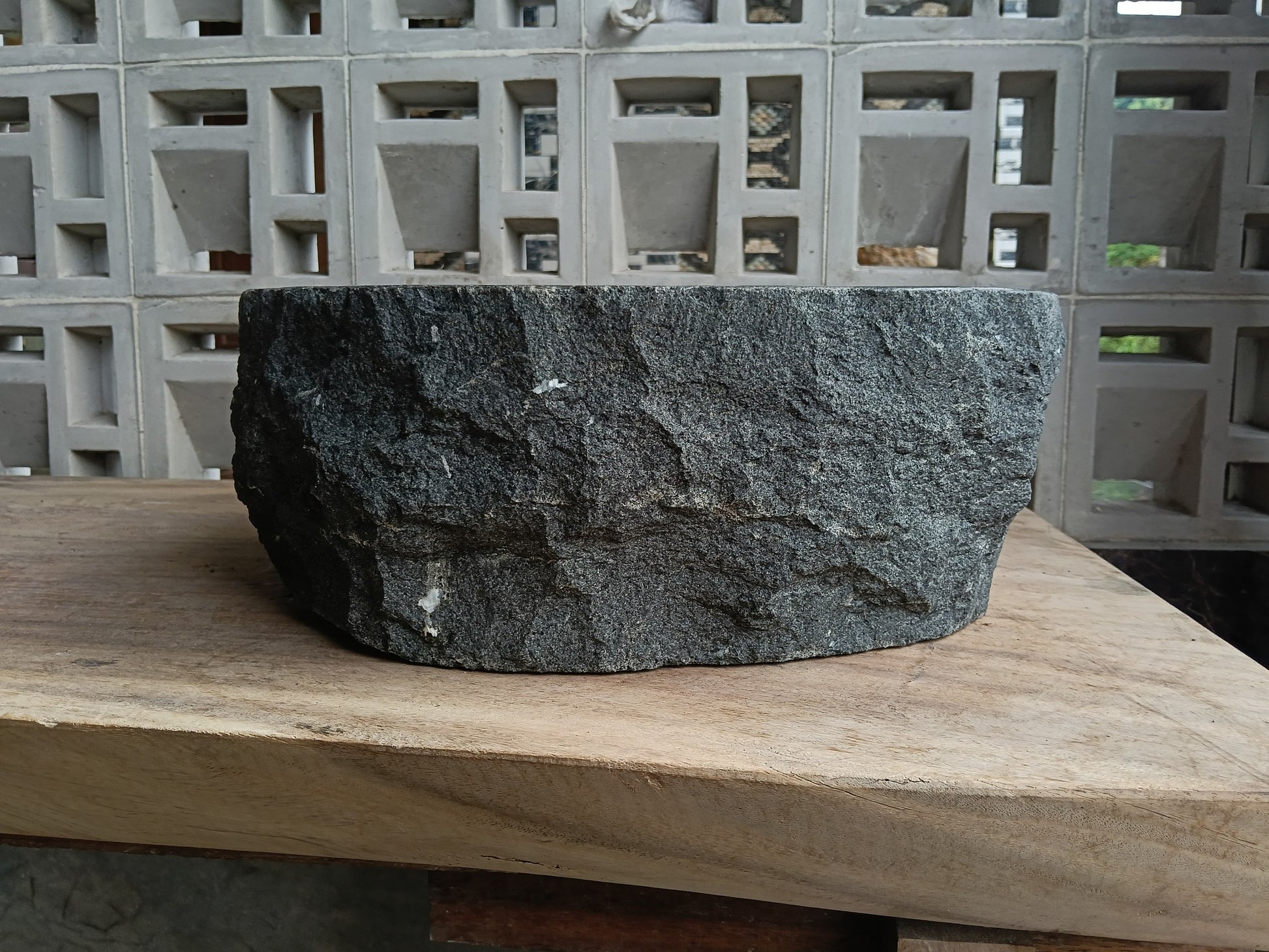 Back view of 60A8-4236 volcanic andesite stone sink — textured natural exterior
