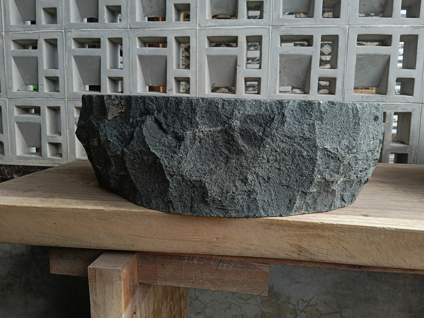 Back view of 60A9-5040 natural andesite basin — textured exterior surface
