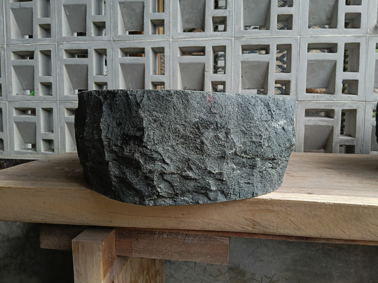 Right side of 60A9-5040 handcrafted andesite vessel — natural graphite texture
