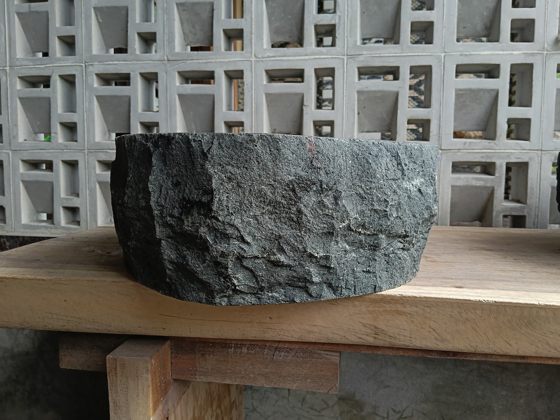Right side of 60A9-5040 handcrafted andesite vessel — natural graphite texture
