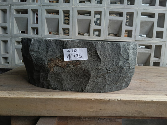 Front view of 6A10-4136 andesite vessel basin — polished oval interior
