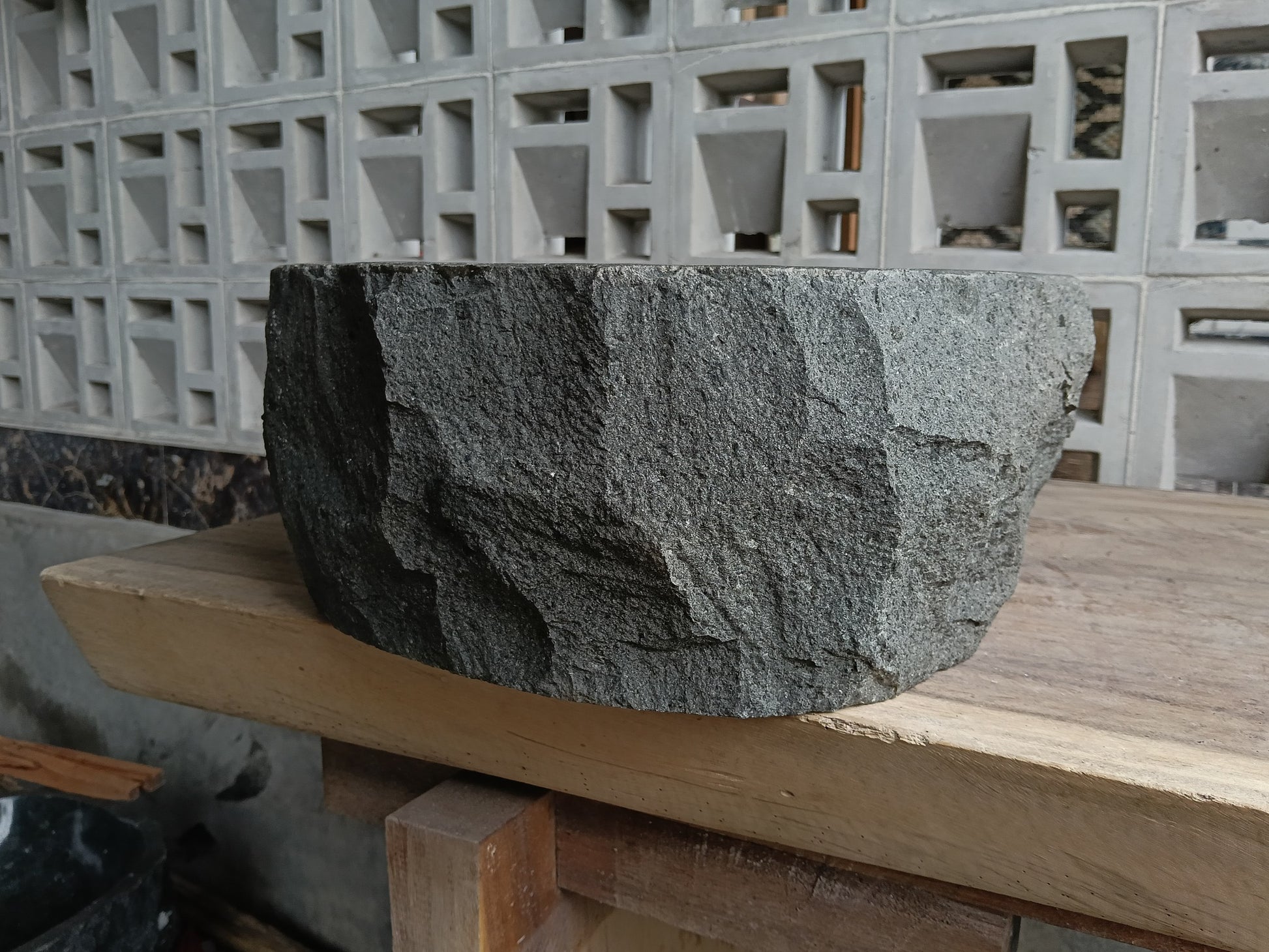 Right side of 6A10-4136 oval andesite vessel sink — smooth interior finish
