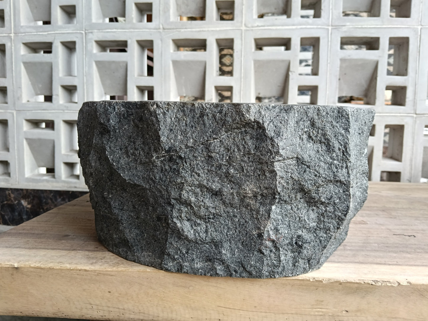Back view of 60A1-4030 volcanic andesite vessel sink — textured exterior
