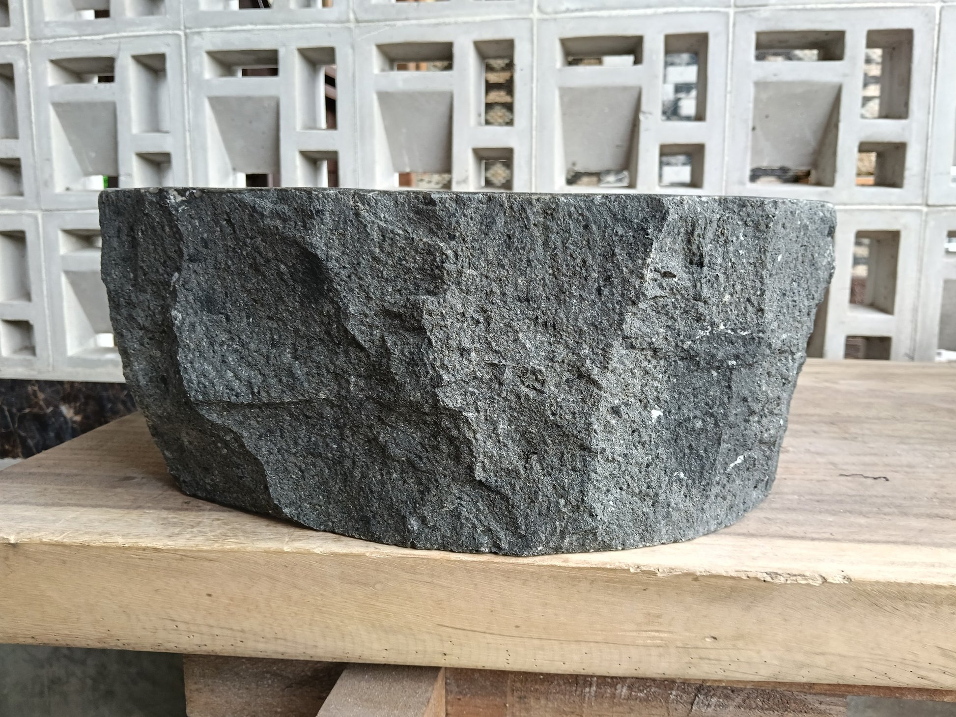 Left side of 60A1-4030 handcrafted dark gray andesite stone sink
