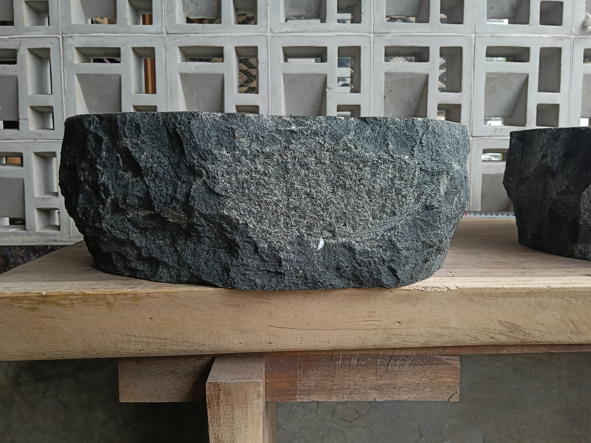 Back view of 6A12-4236 volcanic andesite stone sink — textured natural exterior

