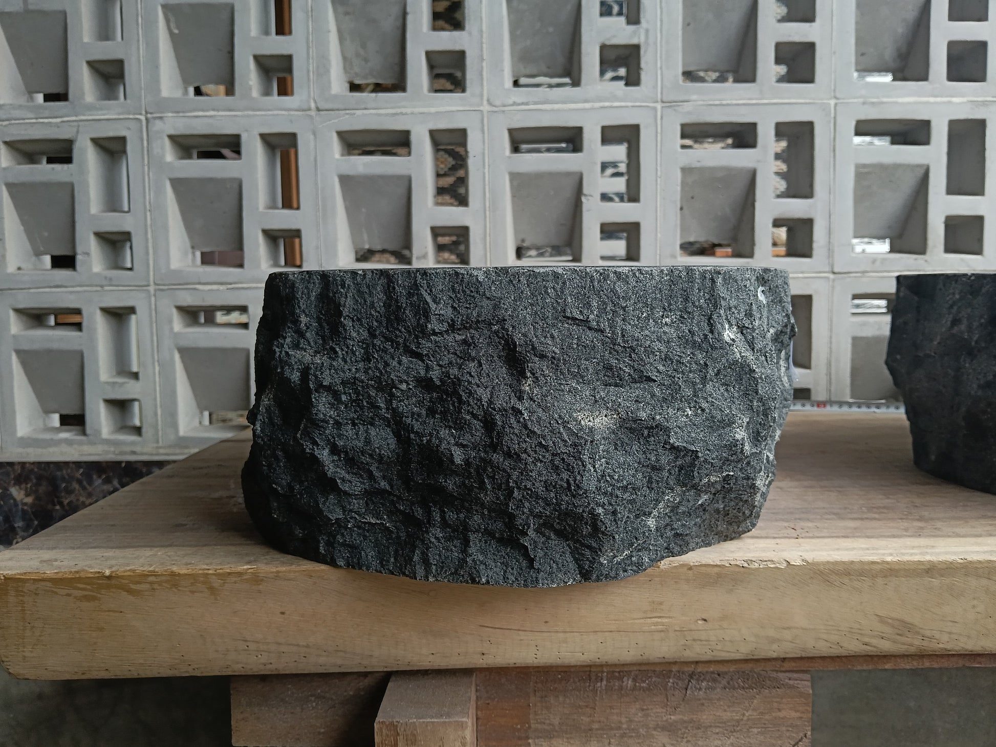 Right side of 6A12-4236 oval andesite vessel sink — smooth interior finish
