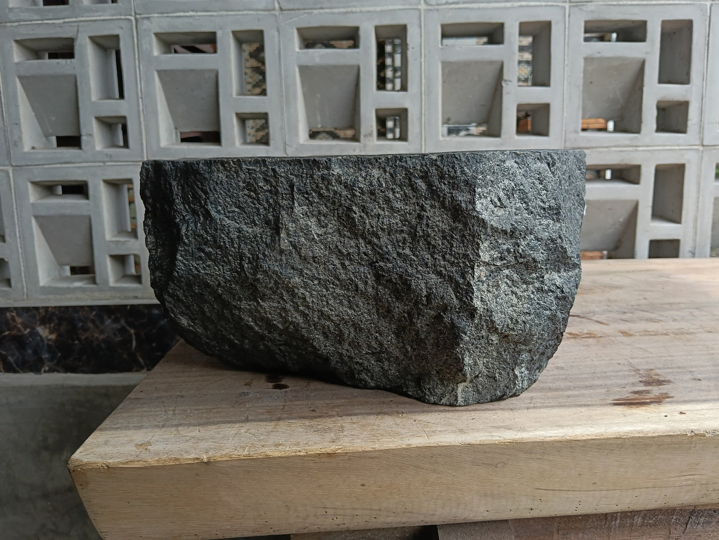 Right side of 6A15-3734 handcrafted andesite vessel — natural graphite texture
