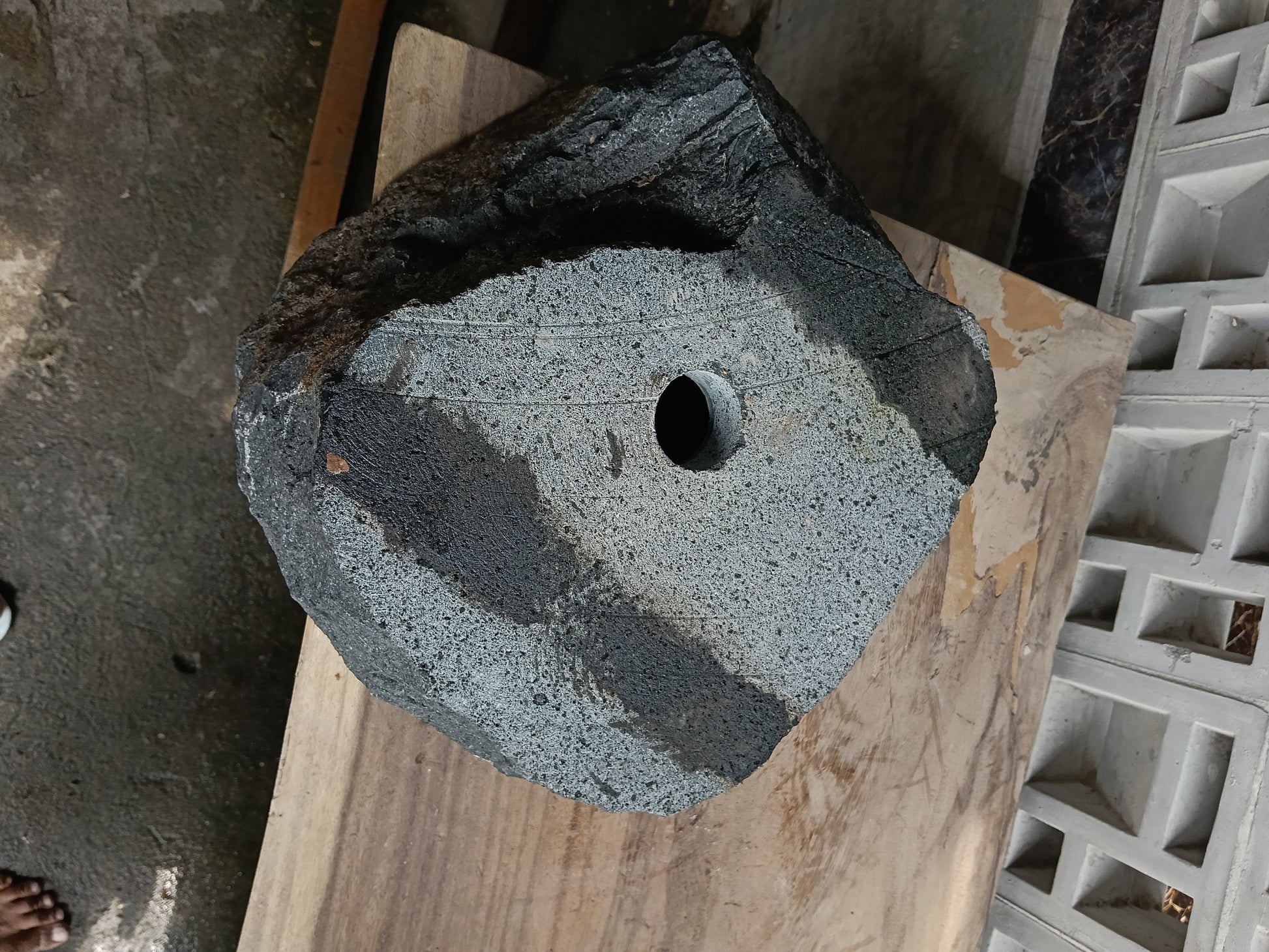 Bottom view of 6A15-3734 solid andesite stone sink — standard drain hole
