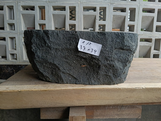Front view of 6A15-3734 andesite stone vessel — polished interior bowl
