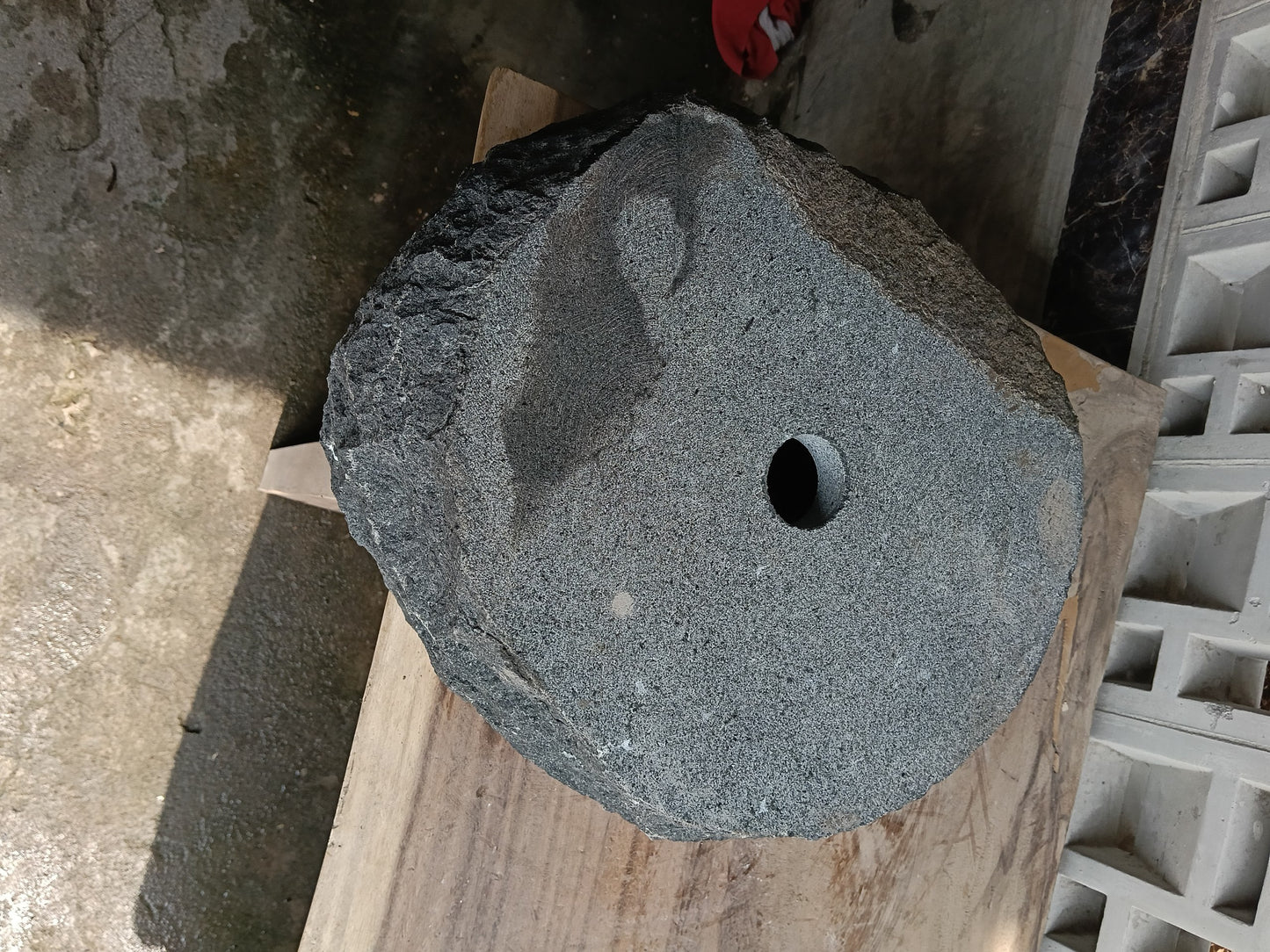 Bottom view of 6A16-4137 solid andesite stone sink — durable natural stone
