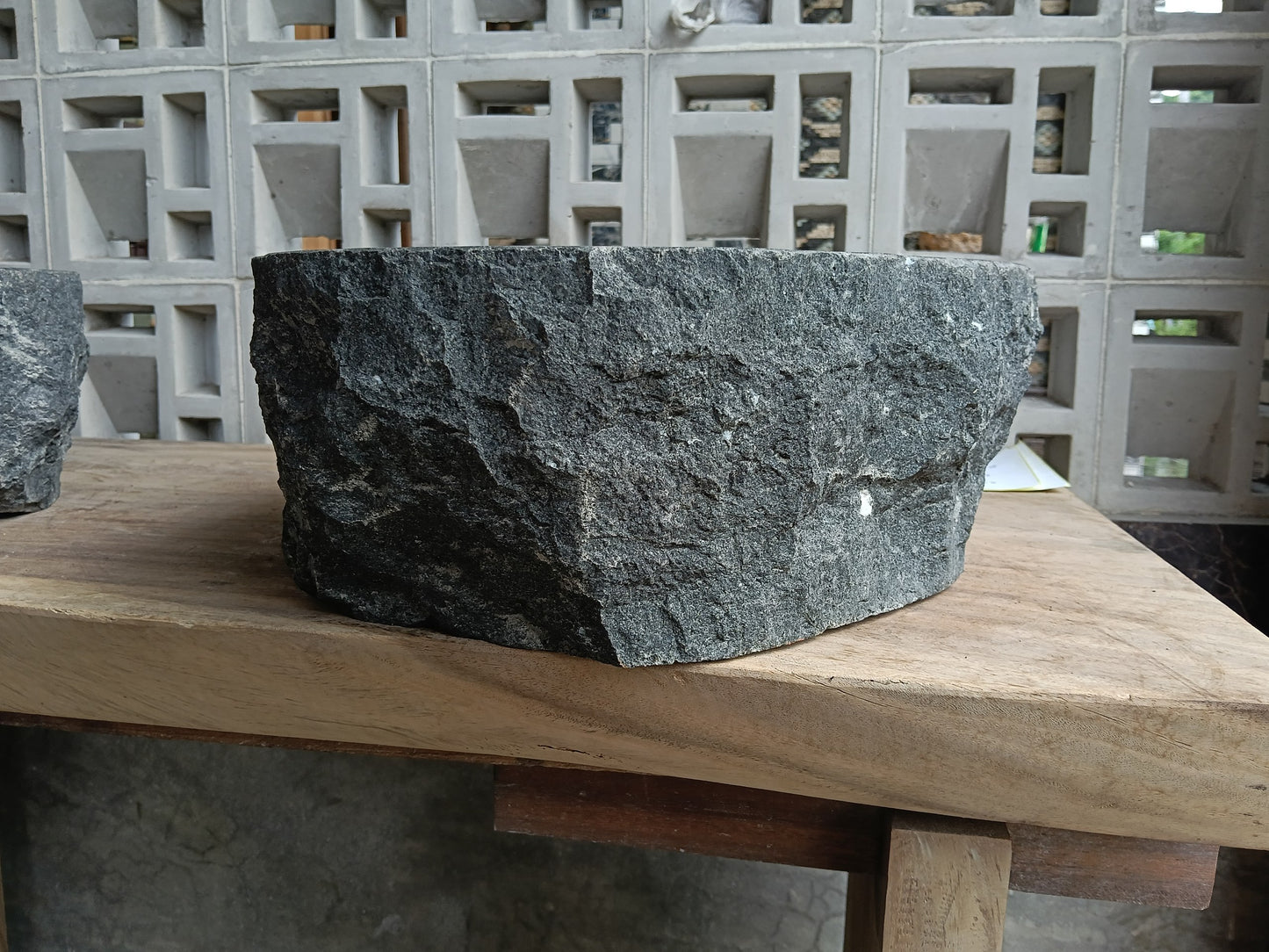 Back view of 6A17-4238 natural andesite basin — textured exterior surface
