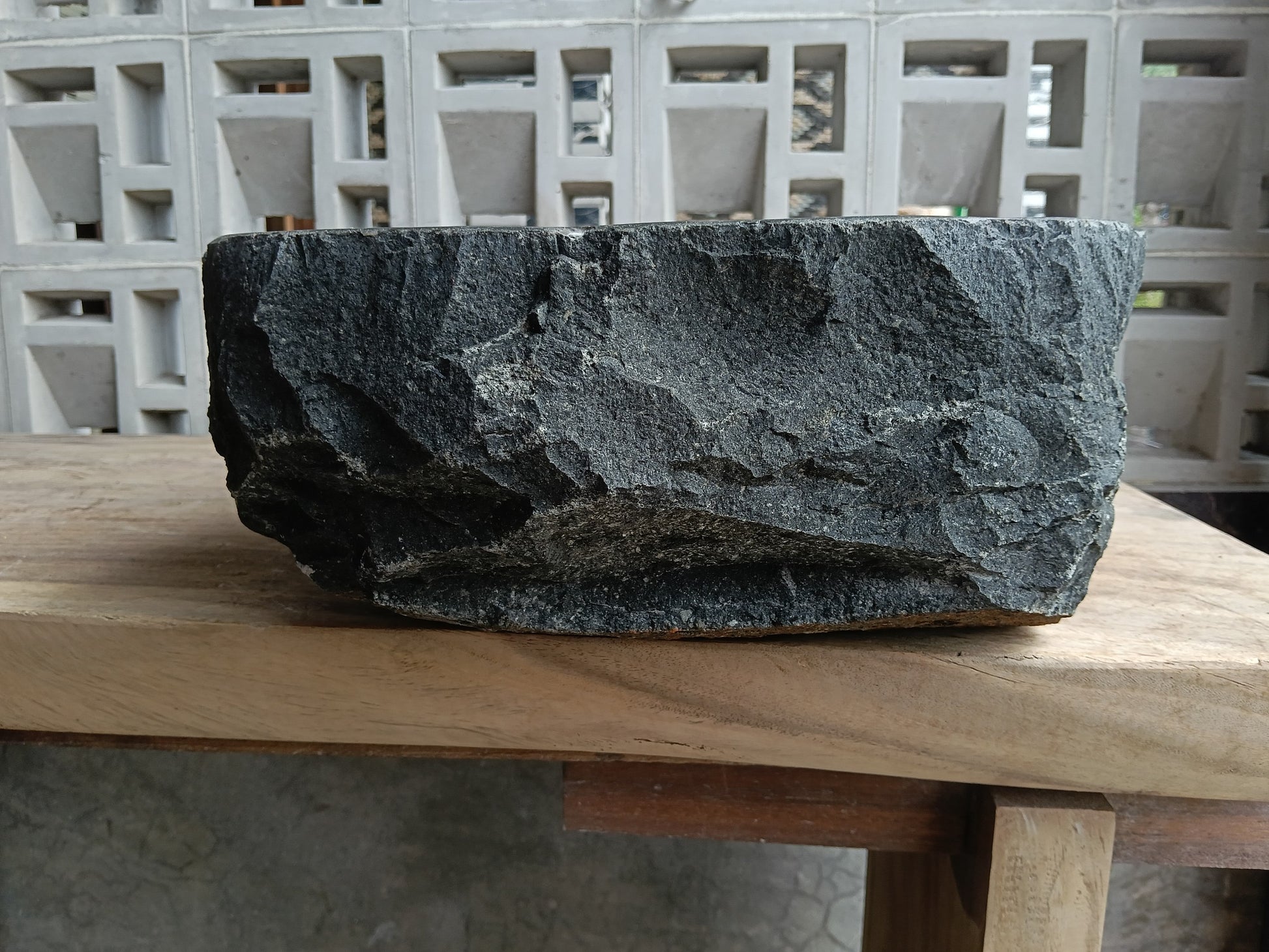 Left side of 6A19-4136 organic oval andesite stone sink
