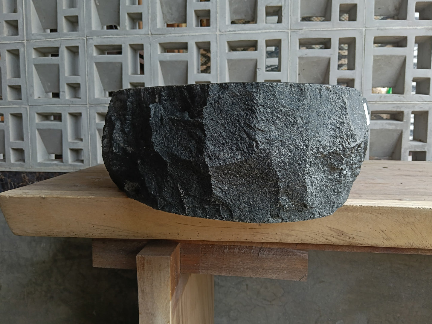 Right side of 6A22-5043 handcrafted andesite vessel — natural graphite texture
