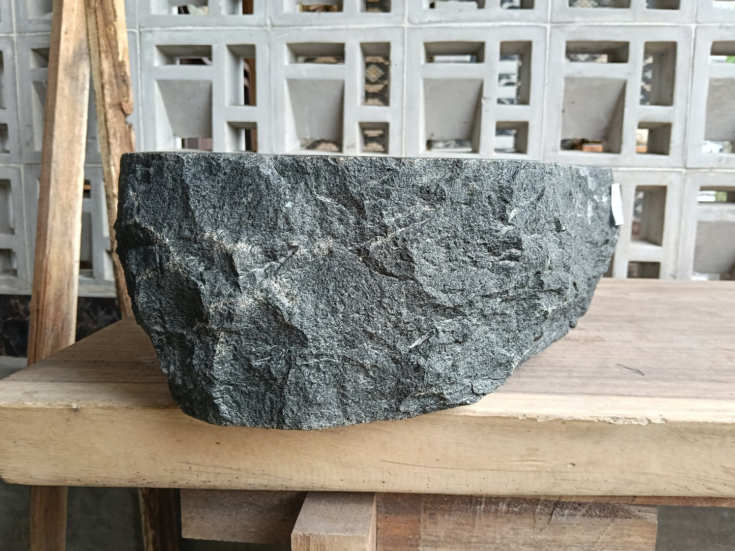 Right side of 60A3-4237 organic andesite vessel sink — smooth interior finish
