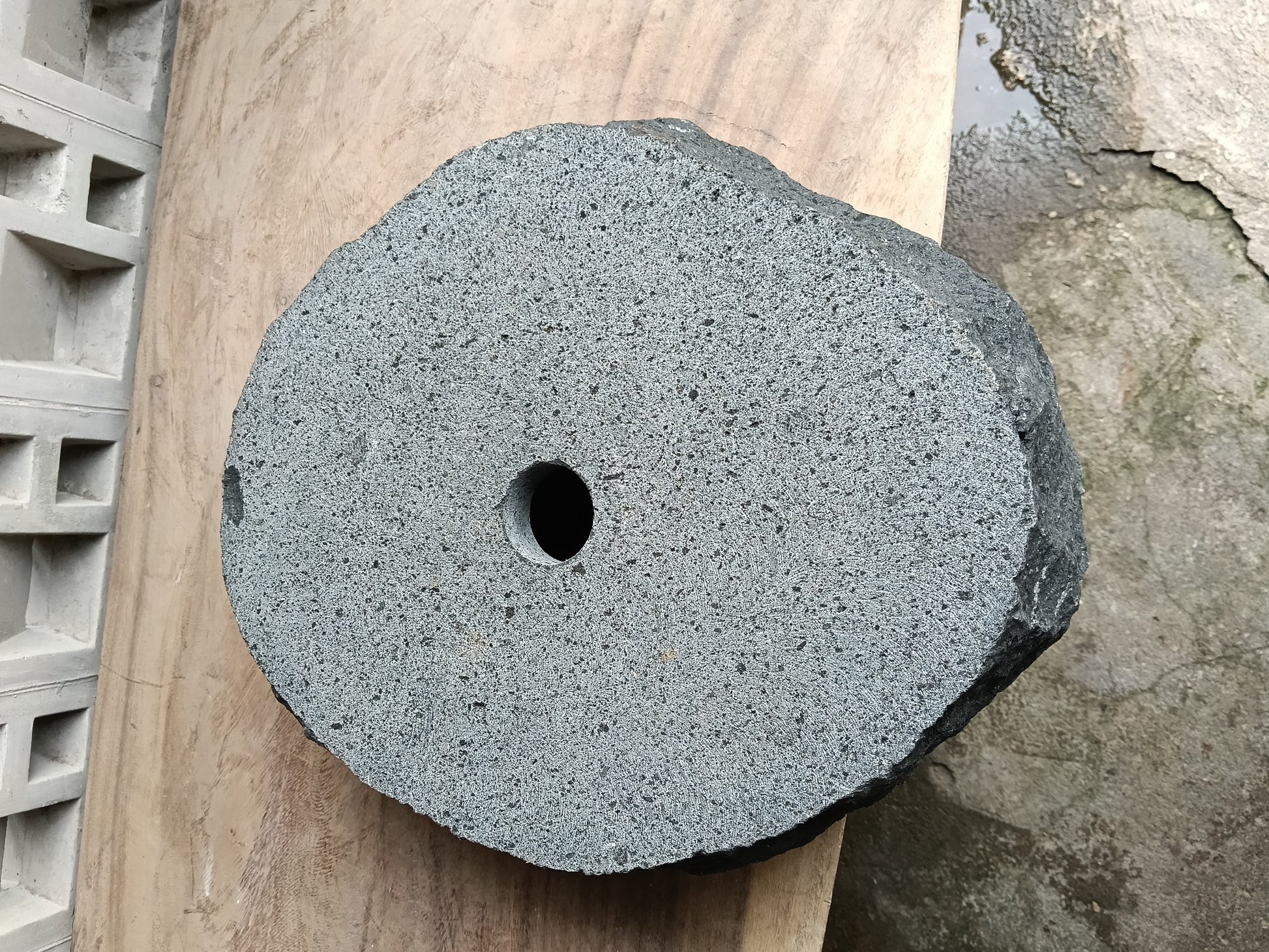 Bottom view of 60A4-4338 solid andesite vessel sink — durable natural stone
