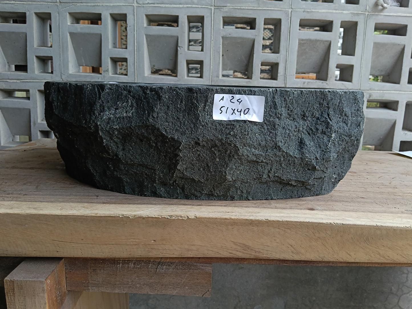 Front view of 6A24-5140 andesite stone vessel — polished interior bowl
