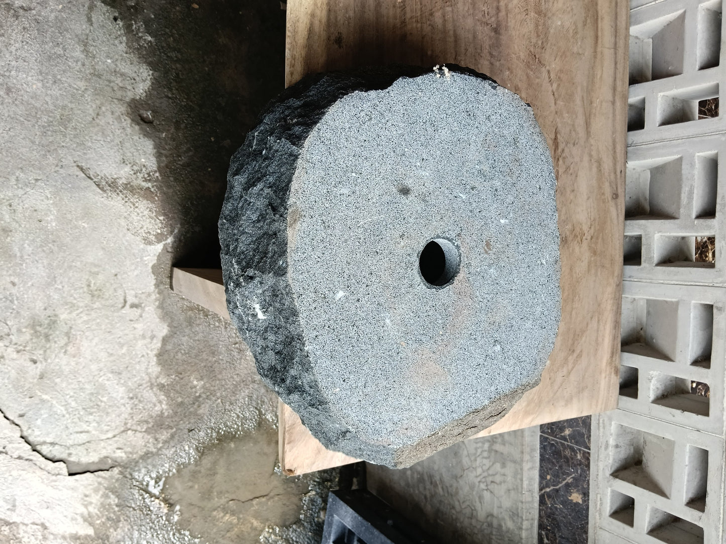 Bottom view of 6A30-4135 solid andesite stone sink — standard drain hole
