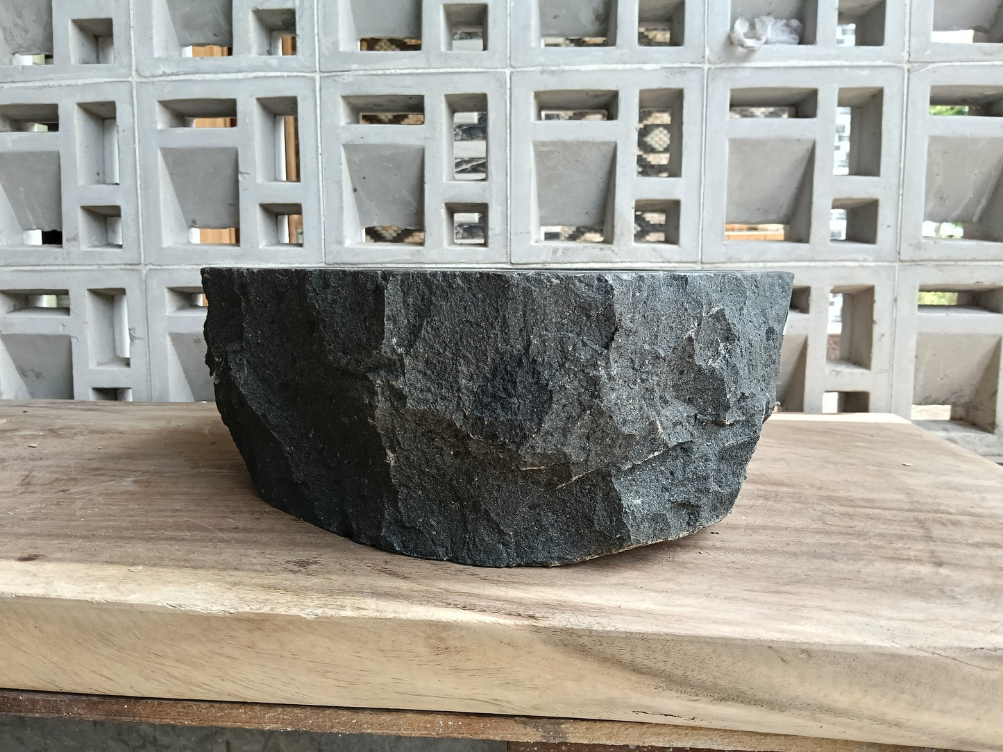 Right side of 6A34-5142 handcrafted andesite vessel — natural graphite texture
