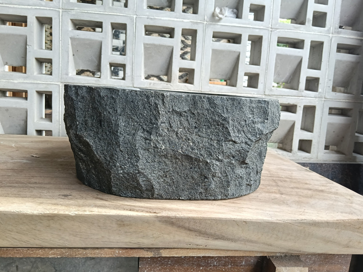 Left side of 6A36-3935 oval andesite stone sink

