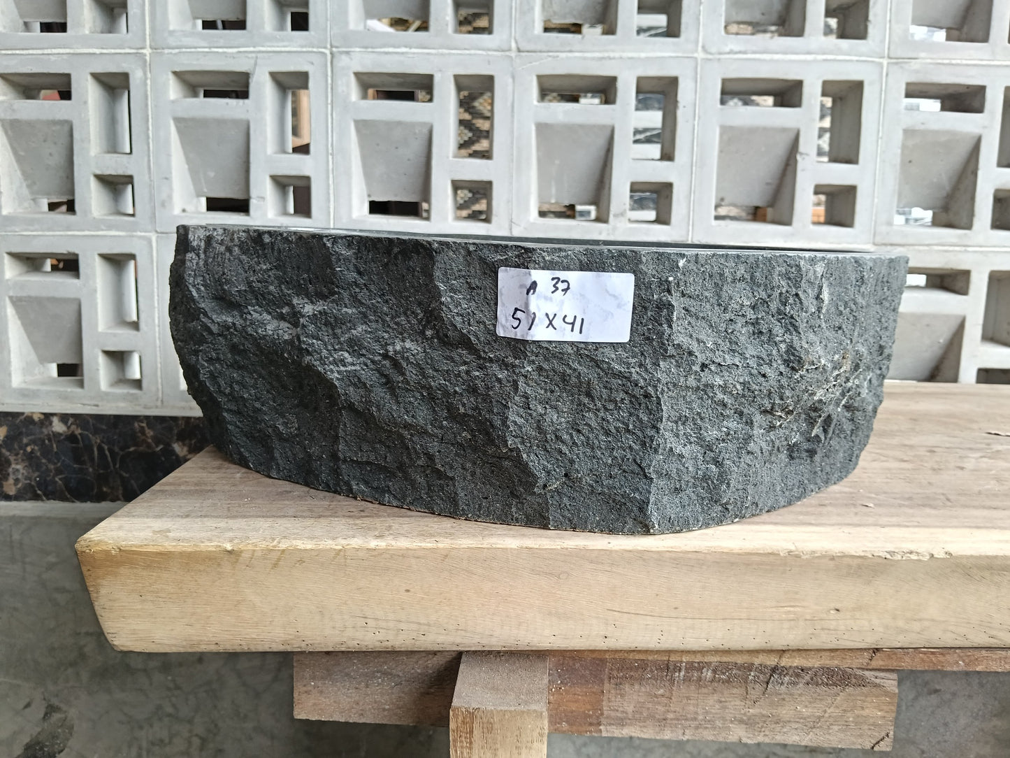 Front view of 6A37-5141 andesite stone vessel — polished interior bowl
