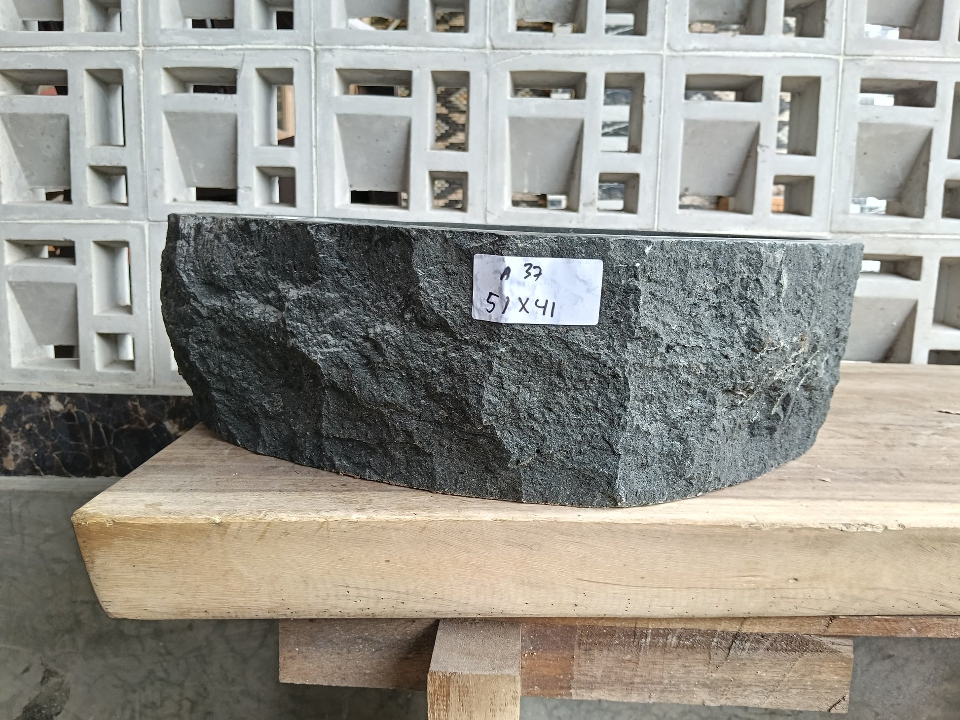 Front view of 6A37-5141 andesite stone vessel — polished interior bowl
