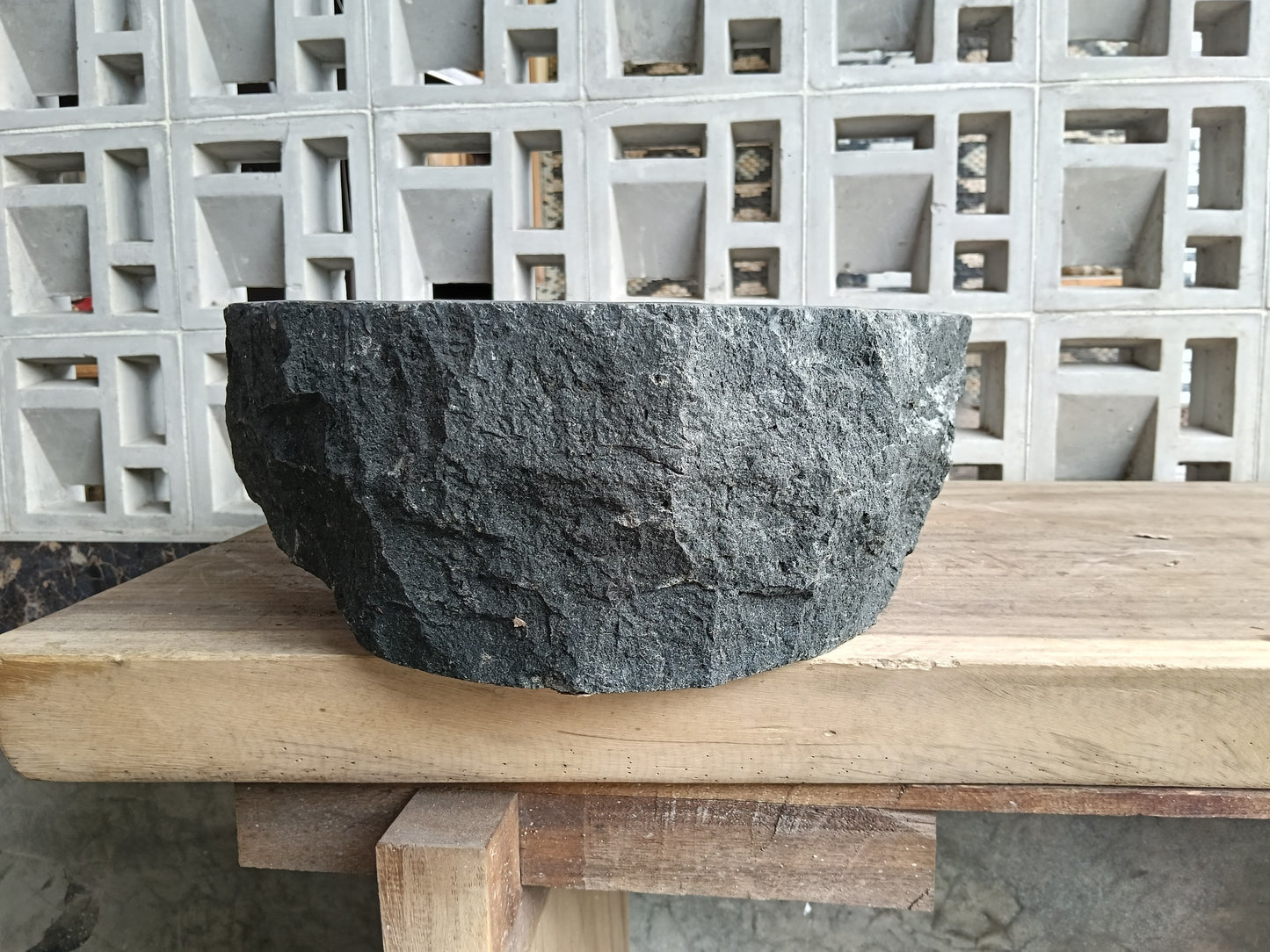 Right side of 6A37-5141 handcrafted andesite vessel — natural graphite texture
