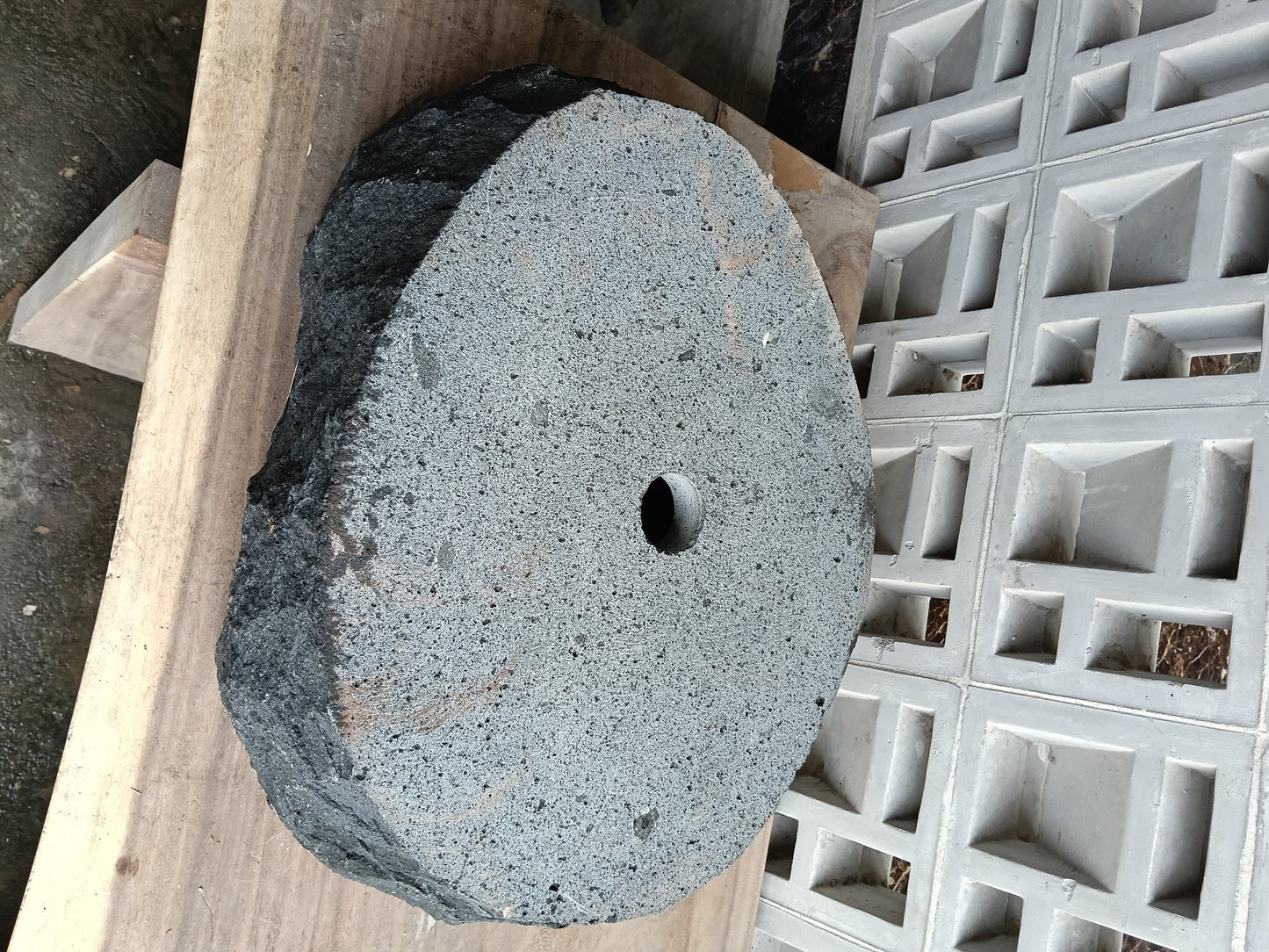 Bottom view of 6A40-5039 solid andesite stone sink — standard drain hole
