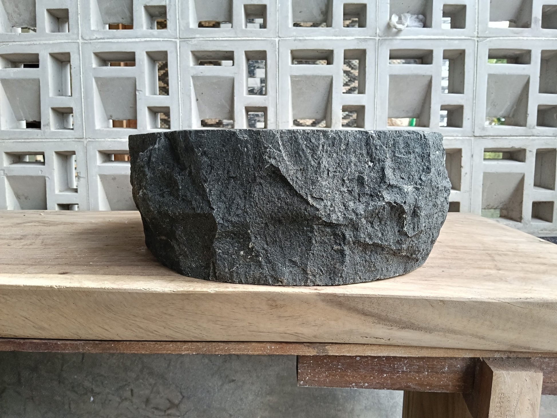 Right side of 6A41-5142 handcrafted andesite vessel — natural graphite texture
