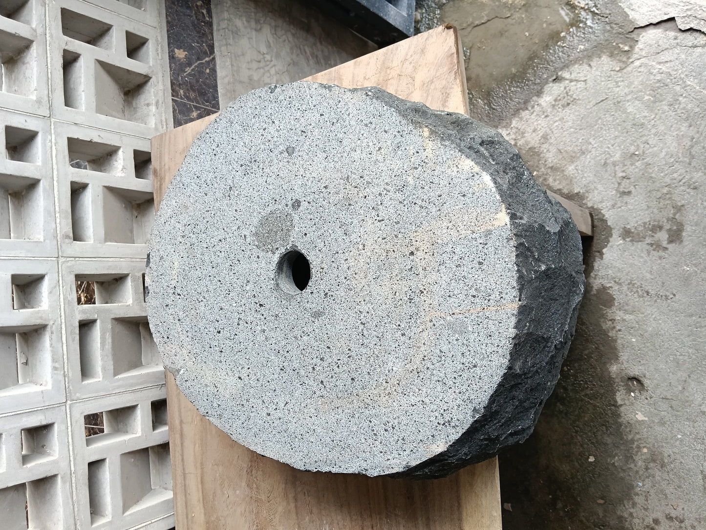 Bottom view of 6A41-5142 solid andesite stone sink — standard drain hole
