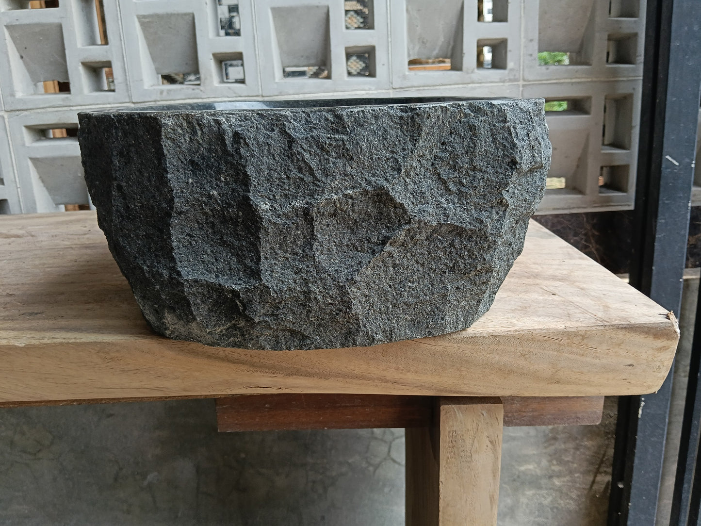 Left side of 6A25-4033 organic oval andesite stone sink
