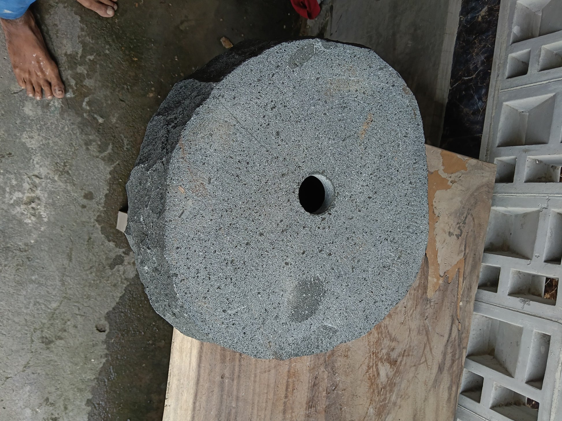 Bottom view of 6A20-4137 solid andesite stone sink — standard drain hole
