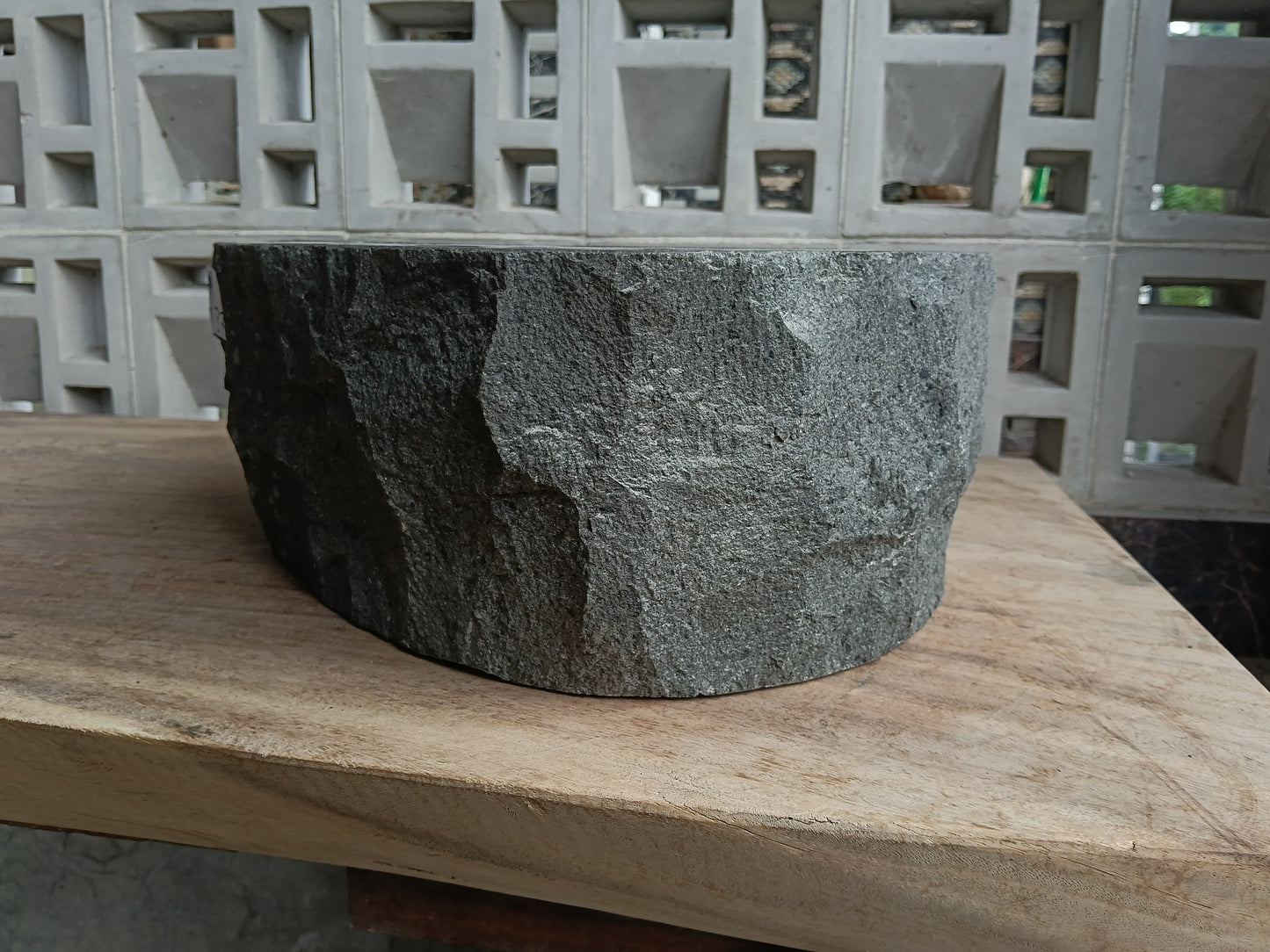 Right side of 6A11-4137 handcrafted andesite vessel — natural graphite texture
