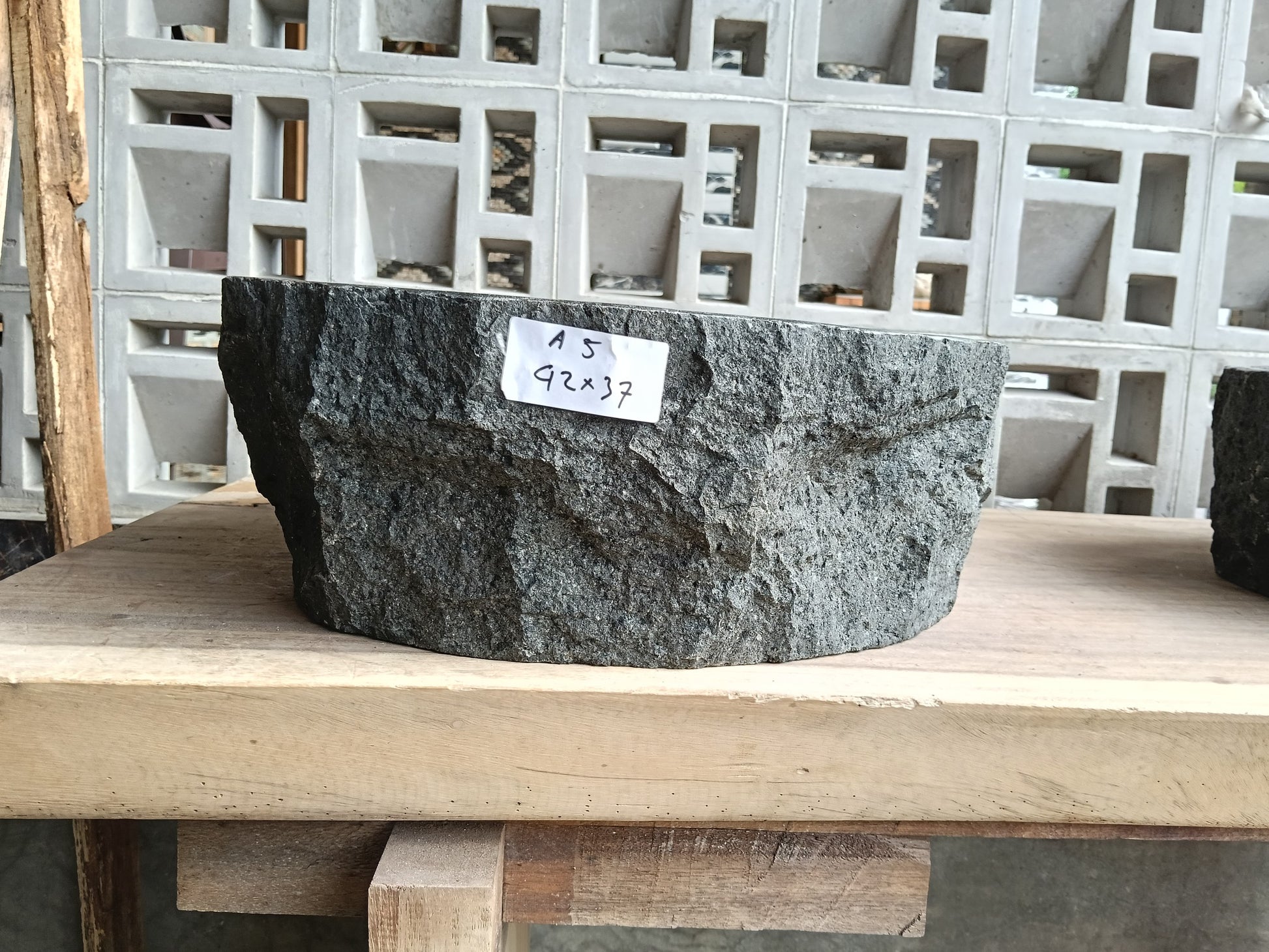 Front view of 6A5-4237 andesite stone vessel — polished interior bowl
