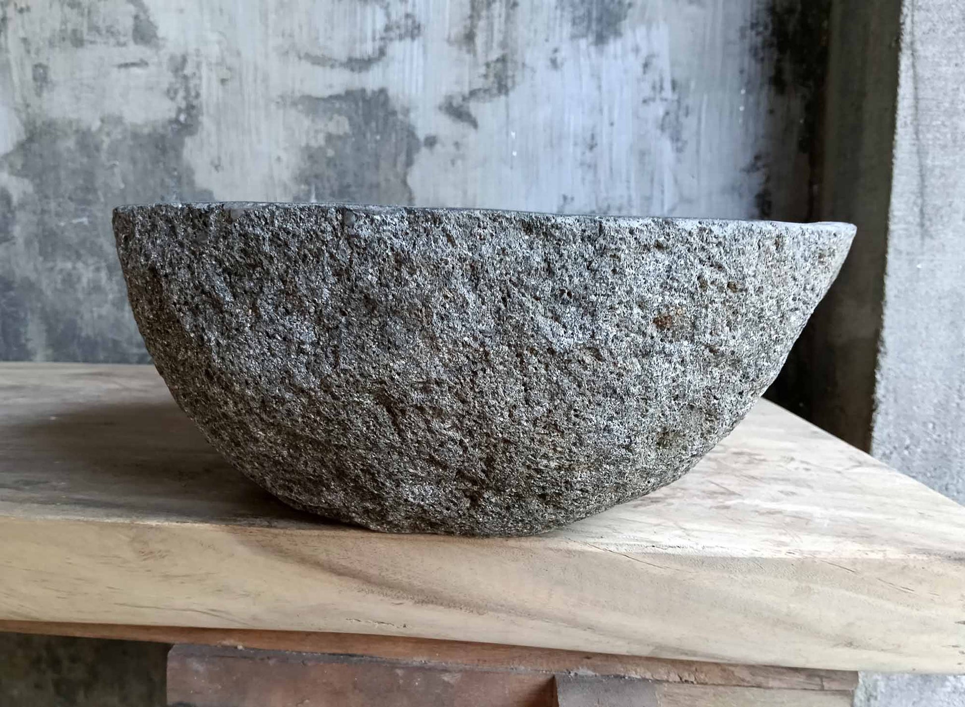 3. Rear-angle view of 6548-1615 river stone sink with natural grain details.
